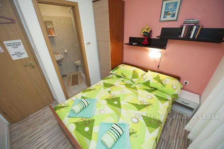 Bolig - forretningsområde (2. etasje og loft) til salgs