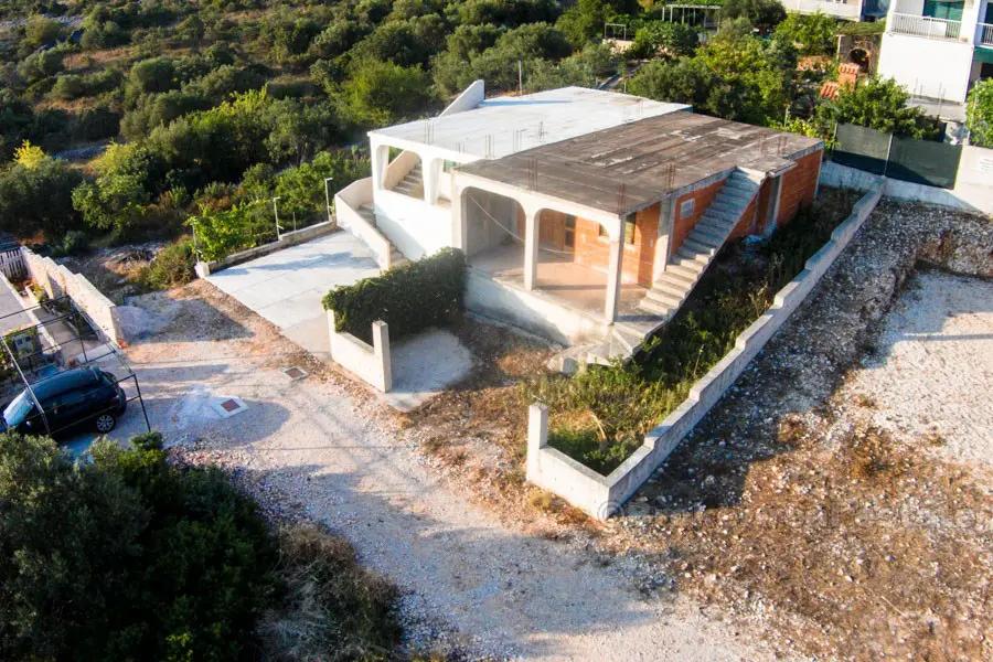 Detached unfinished house for sale