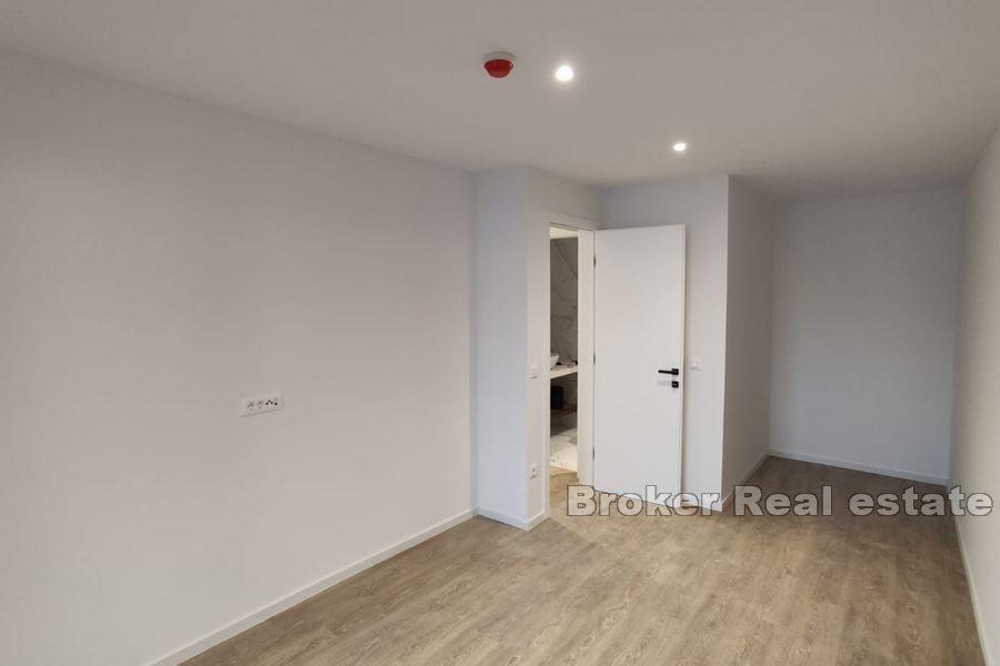 Tvårumslägenheter i nybyggnad med pool