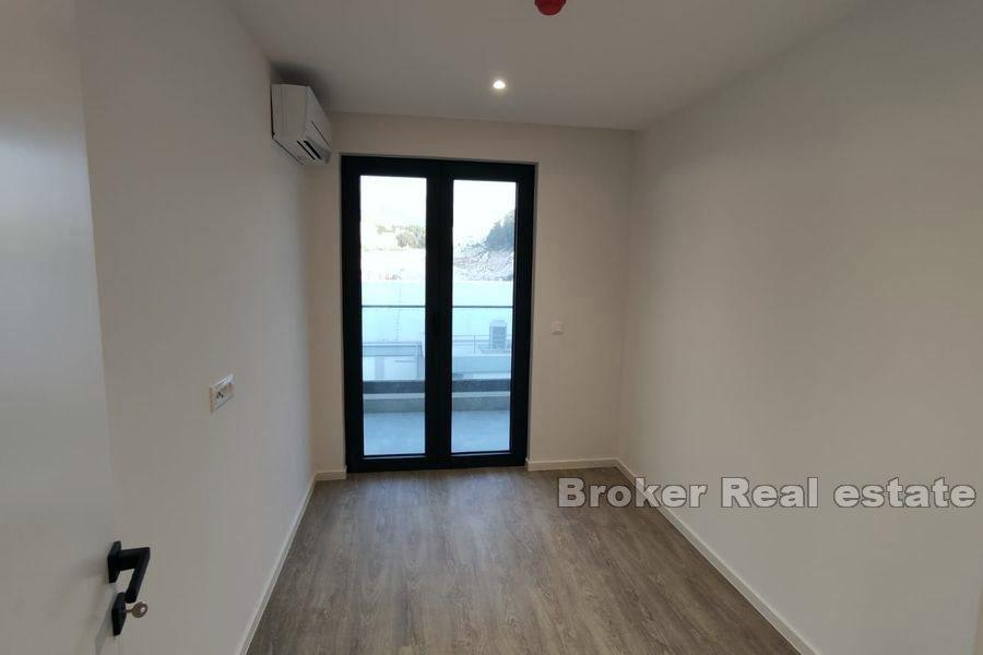 Tvårumslägenheter i nybyggnad med pool