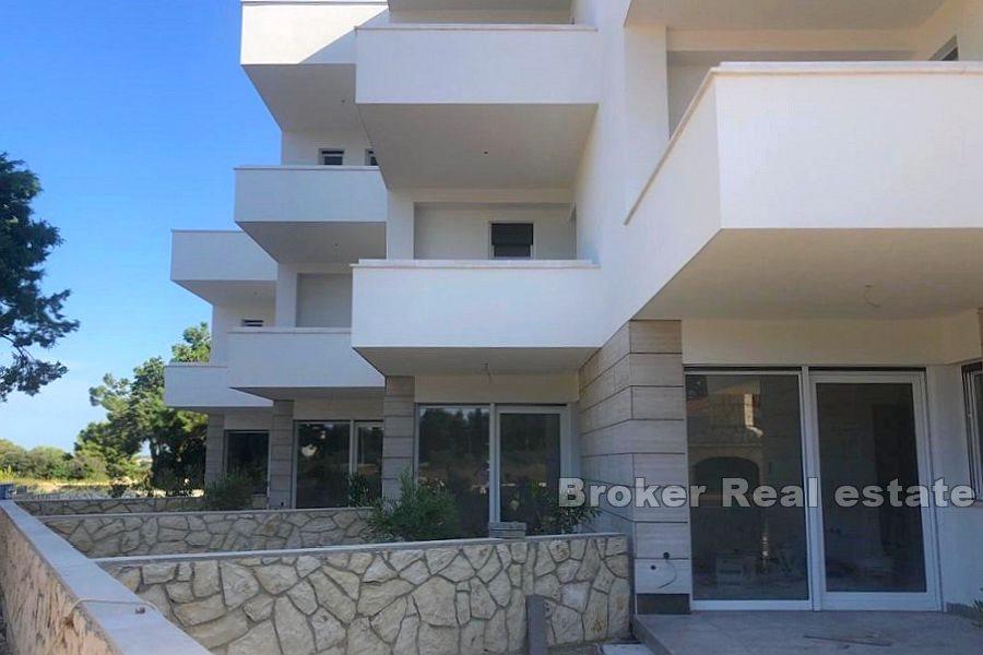 Three-storey apartment with a yard