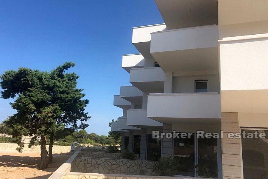 Three-storey apartment with a yard