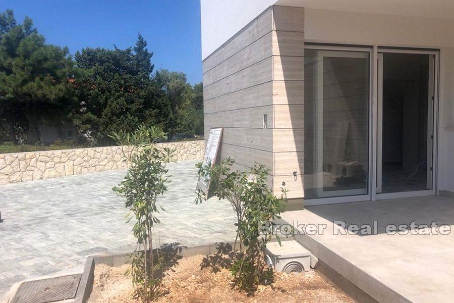 Three-storey apartment with a yard