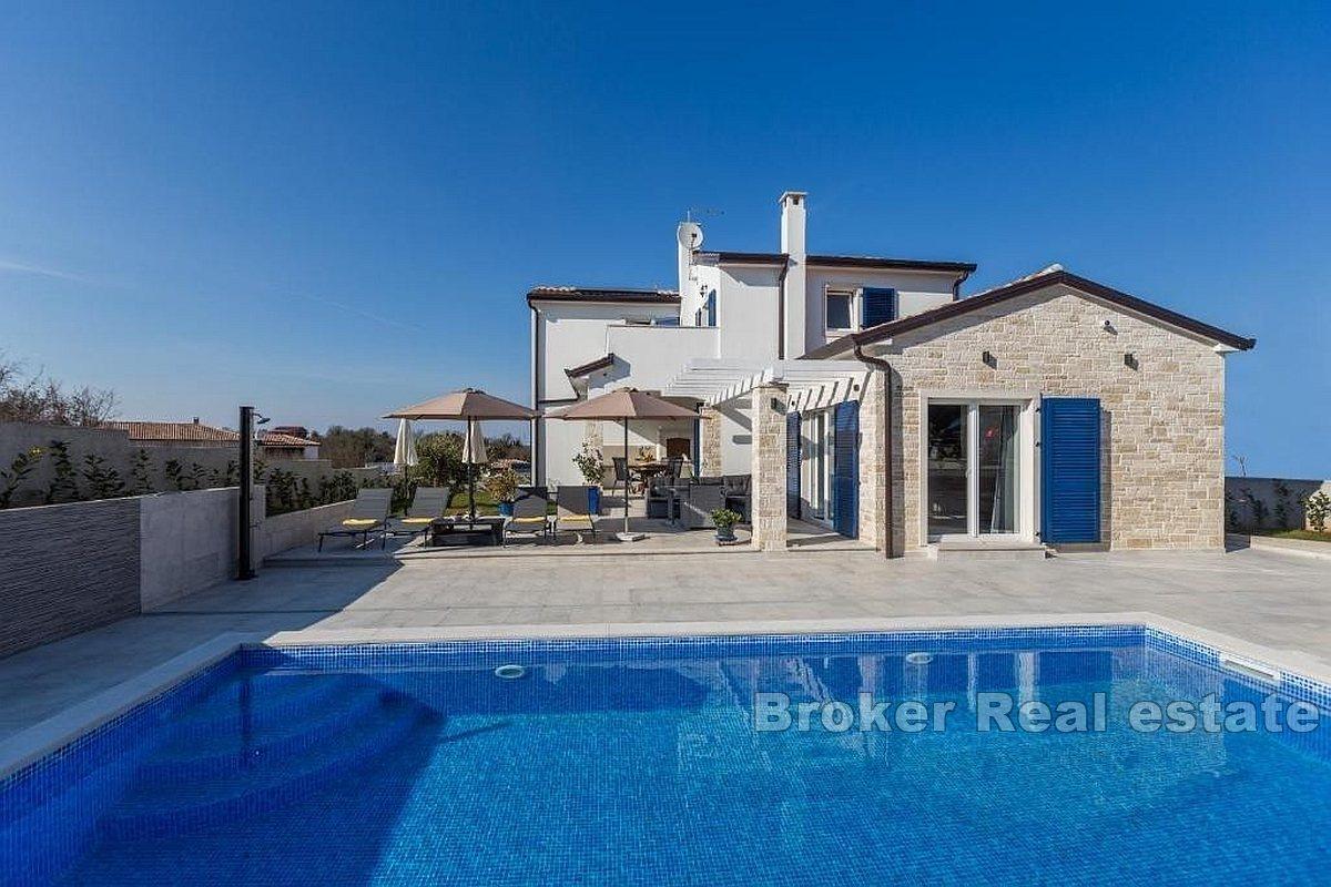 A beautiful villa with a pool near the sea