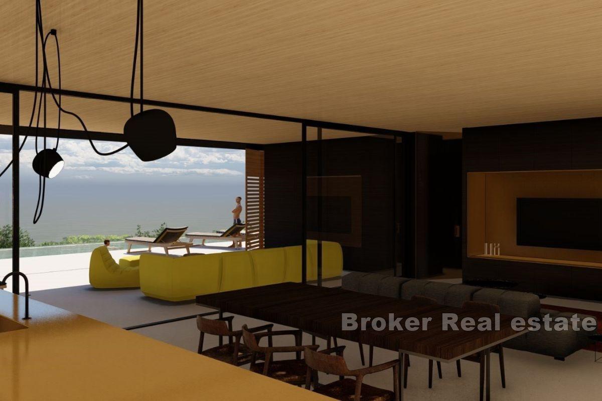 Attractive land with a project with an open view of the sea