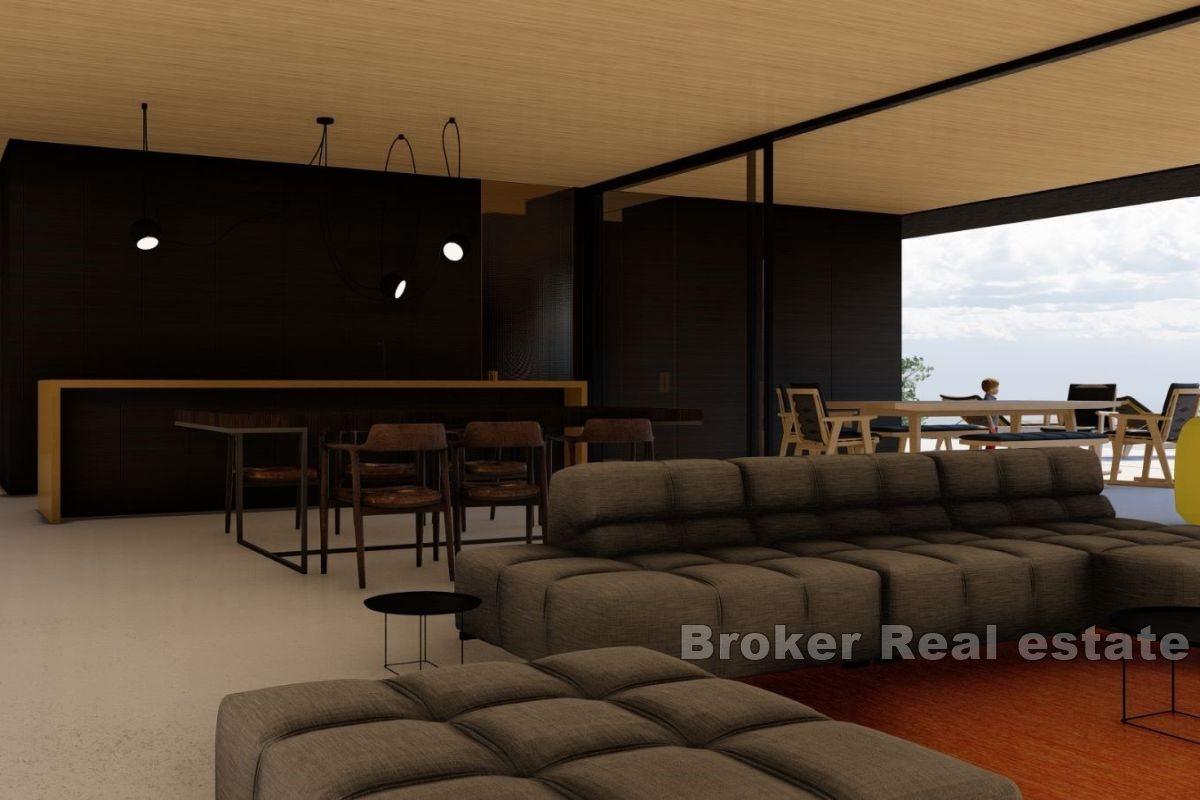 Attractive land with a project with an open view of the sea