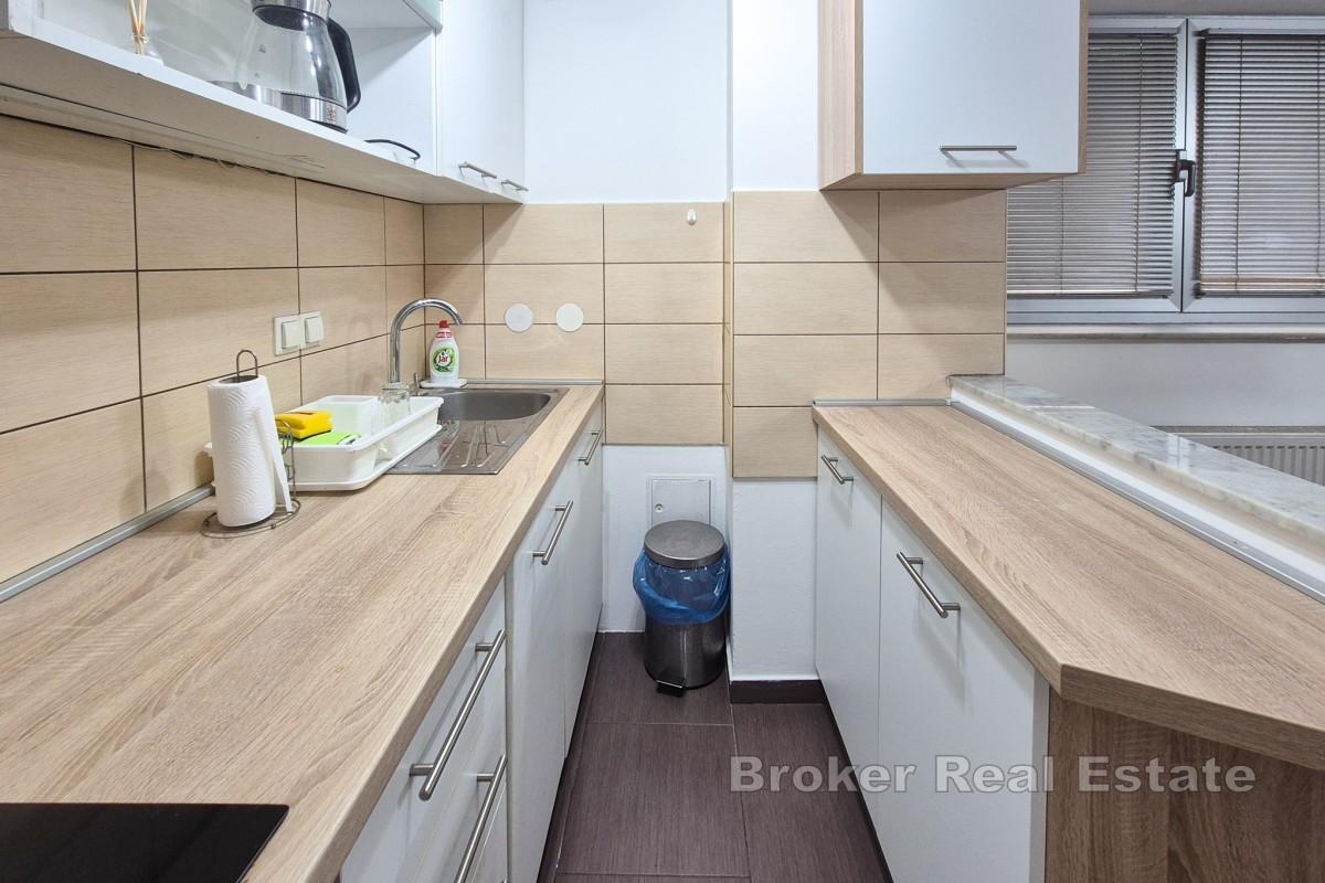 Dvoupodlažní byt se dvěma ložnicemi blízko centra