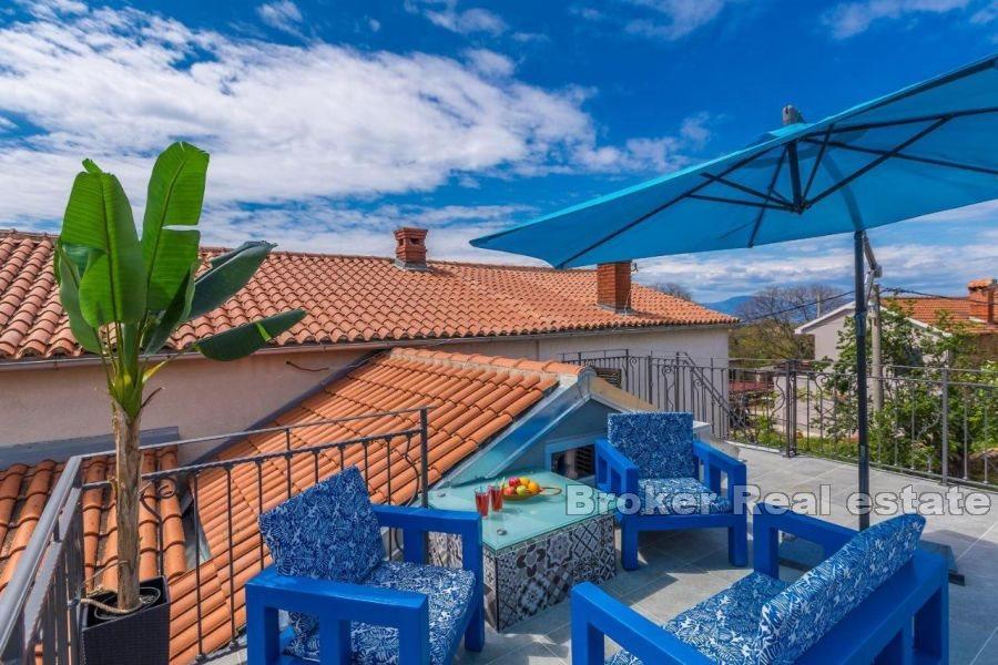 Maison en pierre avec vue mer