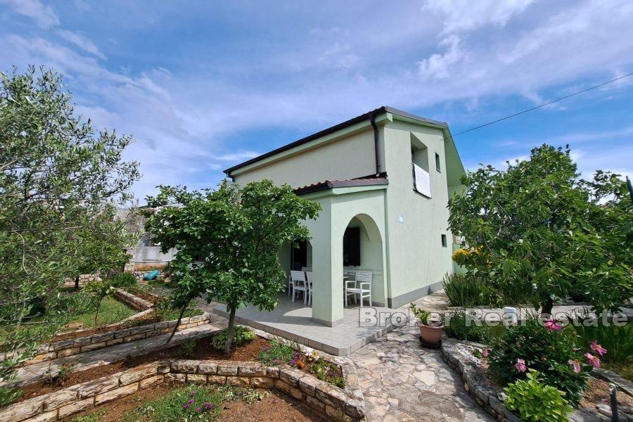 Family house with three residential units
