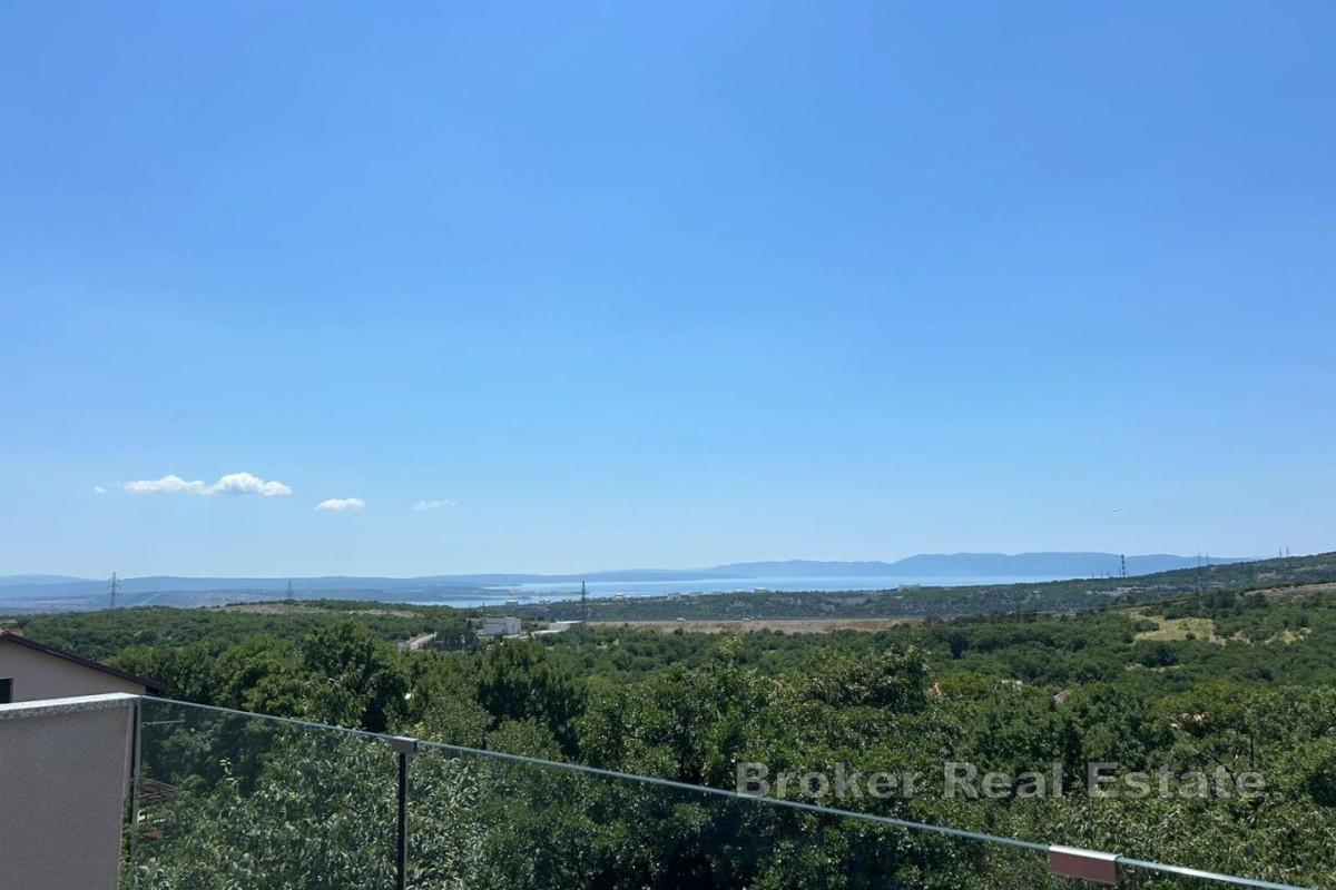 Modernes Einfamilienhaus mit Meer- und Naturblick