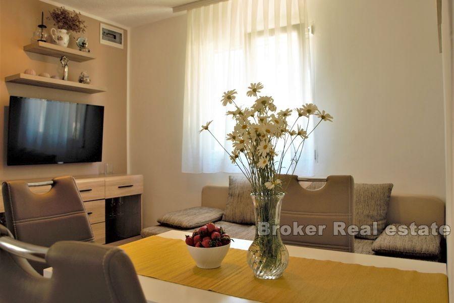 Stavební pozemek s malým domem