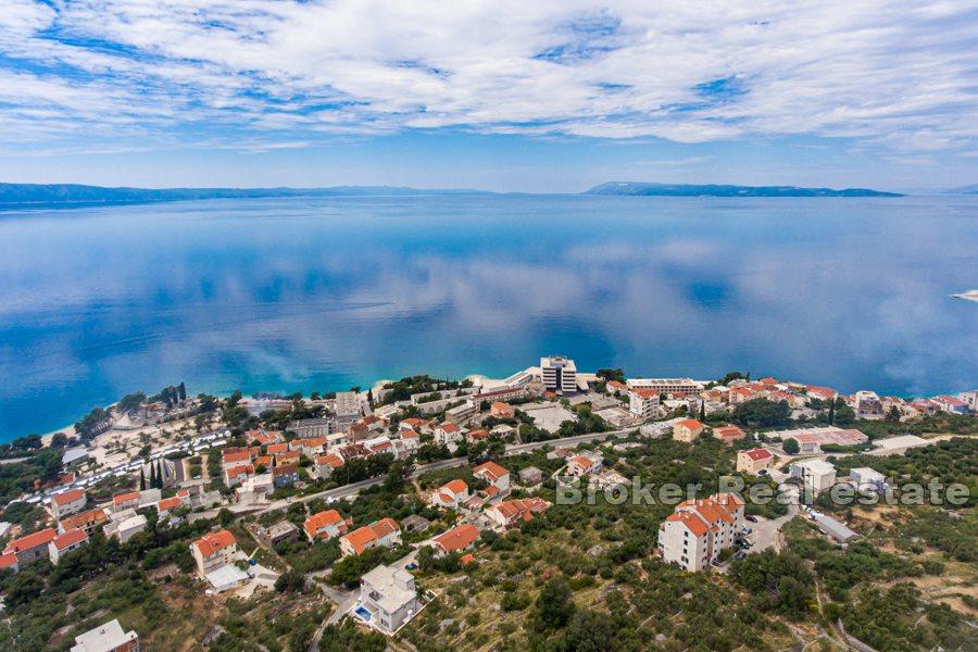 Lägenhet med ett sovrum med trädgård