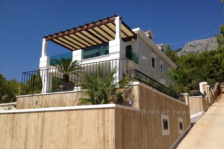 Beautiful villa at first row the sea sea