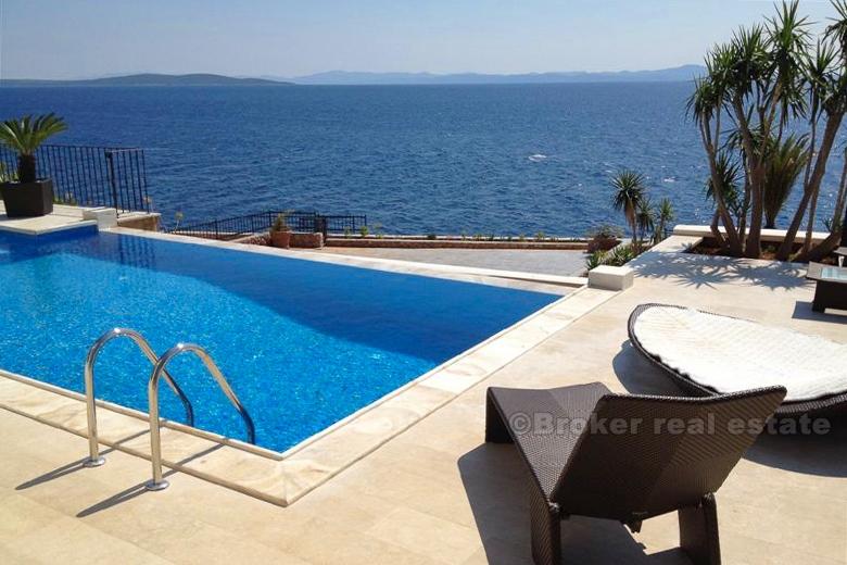 Beautiful villa at first row the sea sea