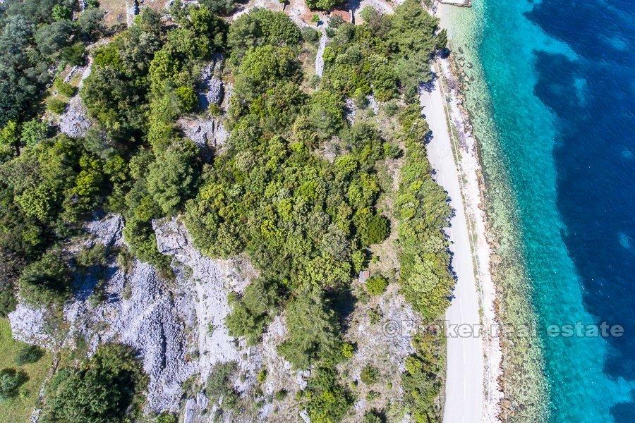 Terrain à bâtir, première rangée à la mer, à vendre