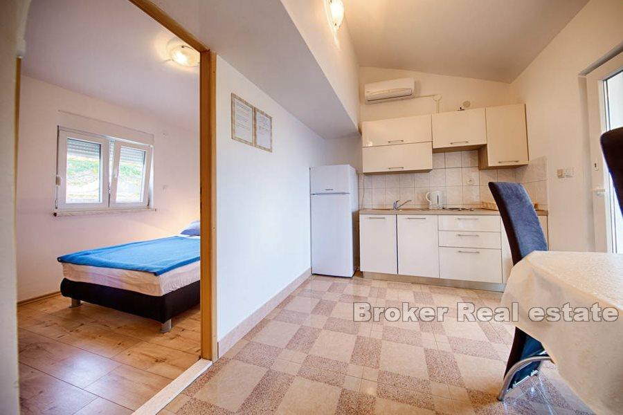 Apartment house first row to the sea