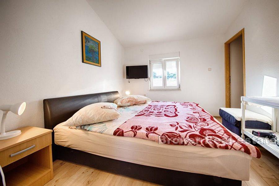 Apartment house first row to the sea