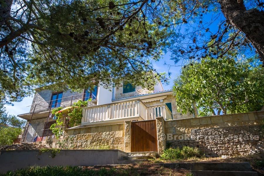Maison pieds dans l'eau avec lande, à vendre