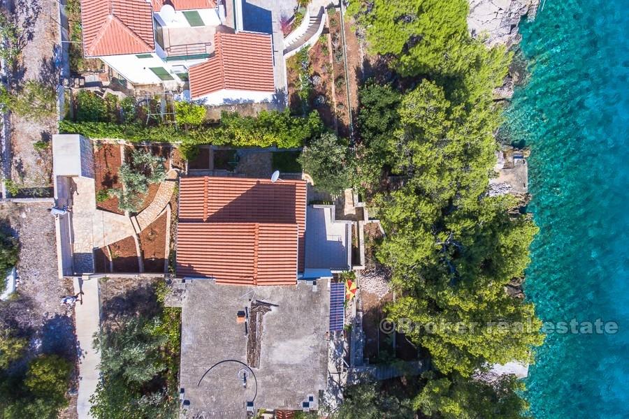 Maison pieds dans l'eau avec lande, à vendre