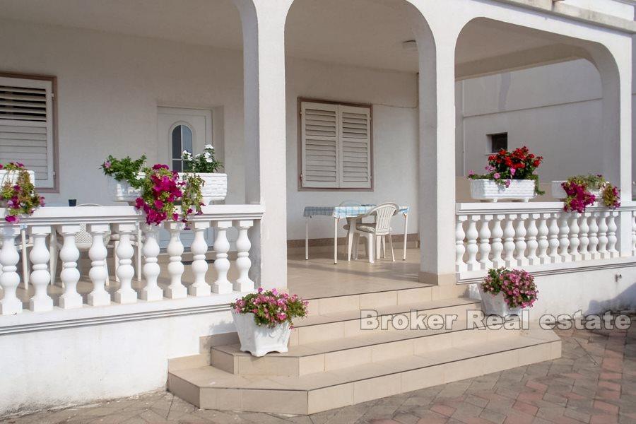 Apartment house by the sea and promenade
