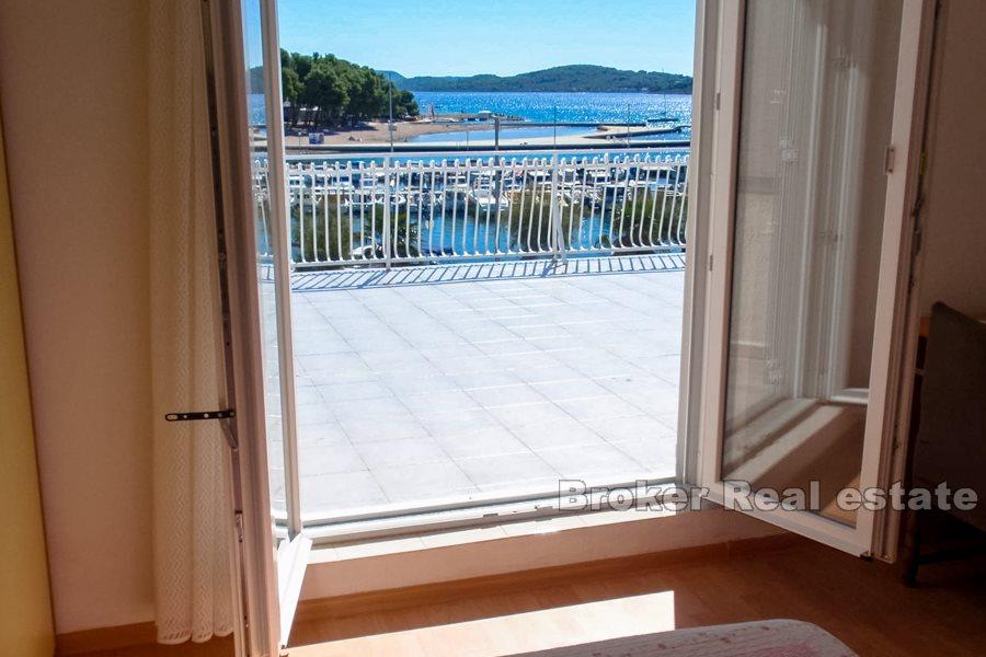 Apartment house by the sea and promenade