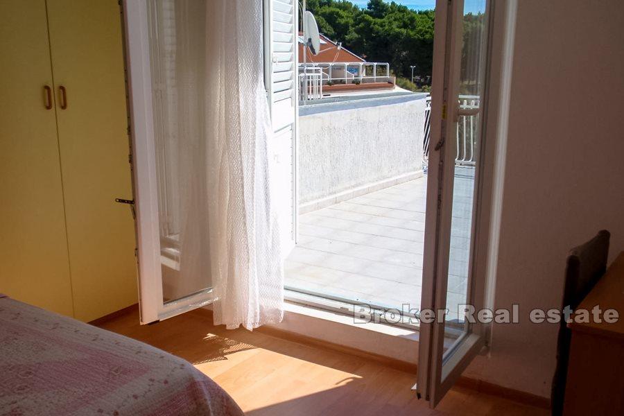 Apartment house by the sea and promenade