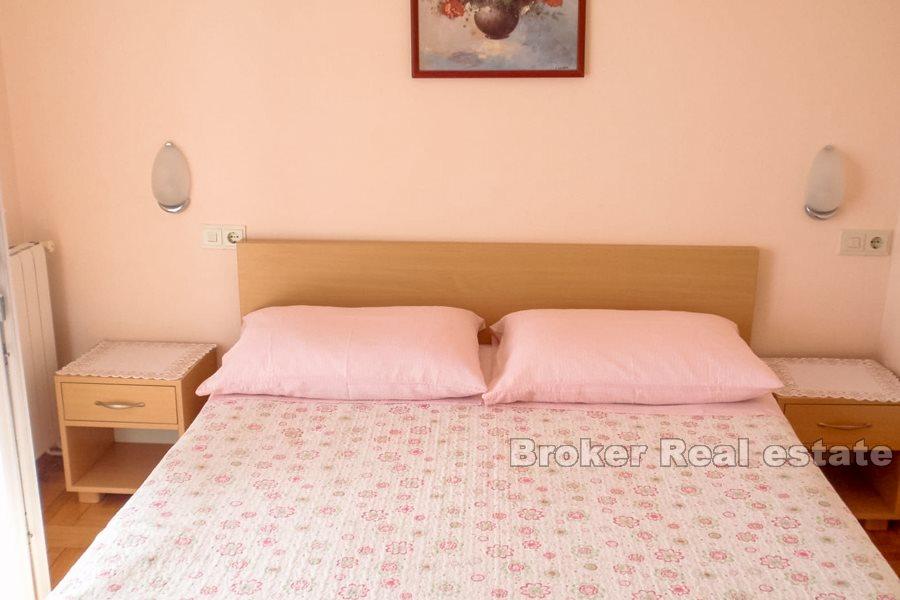 Apartment house by the sea and promenade