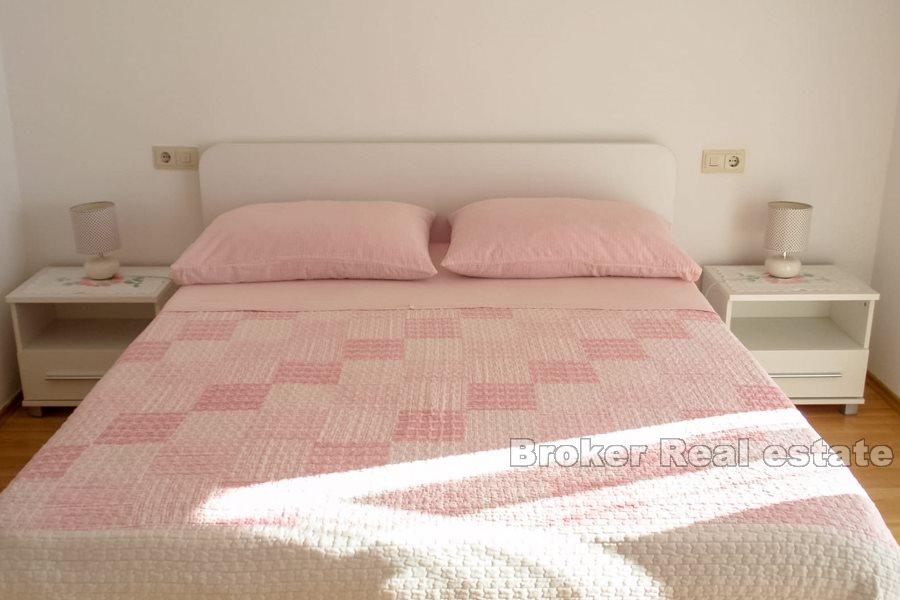 Apartment house by the sea and promenade