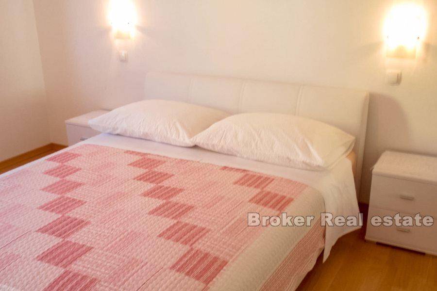 Apartment house by the sea and promenade