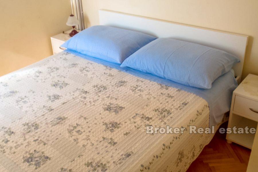 Apartment house by the sea and promenade