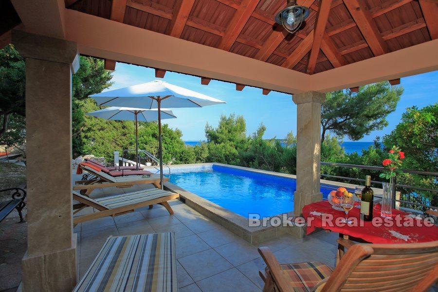 Stone house with pool, by the sea