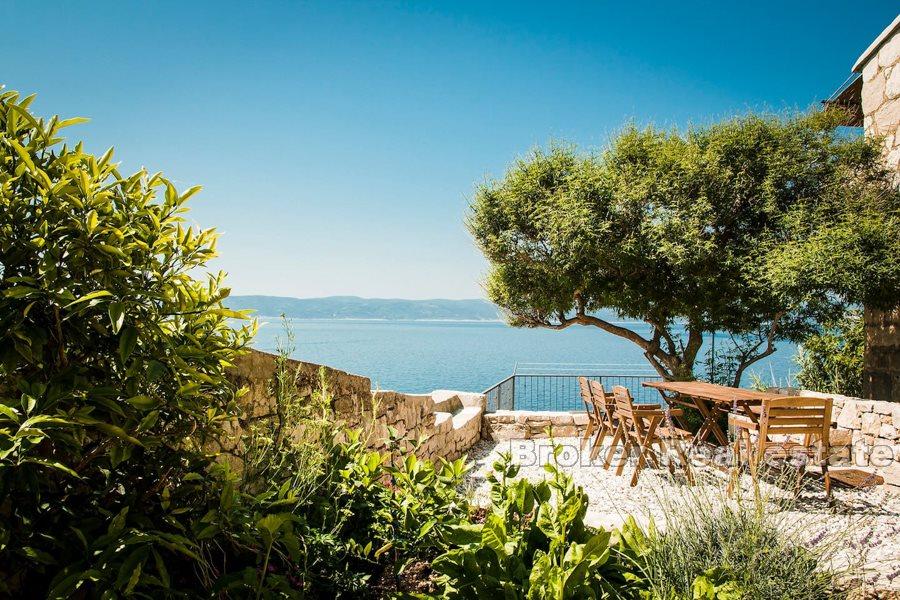 Modern and renovated stone house, seafront