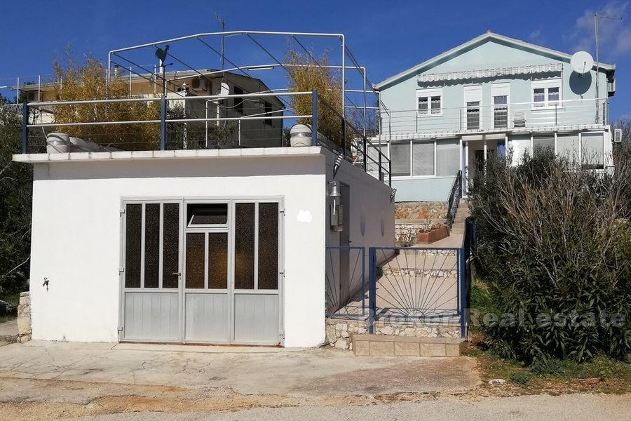 Maison en première rangée de la mer