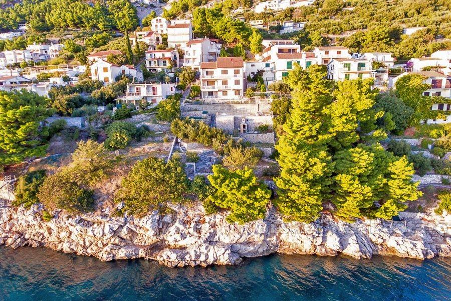 Unfinished house in the first row to the sea