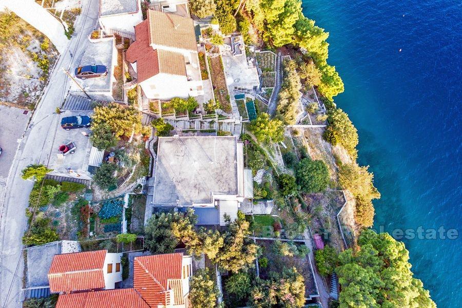 Unfinished house in the first row to the sea