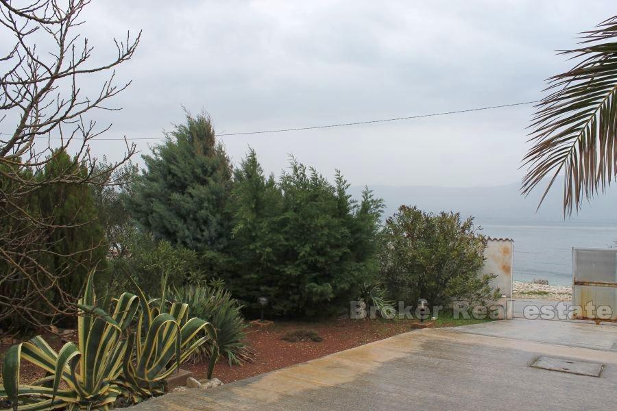 Building land with prefabricated house, for sale