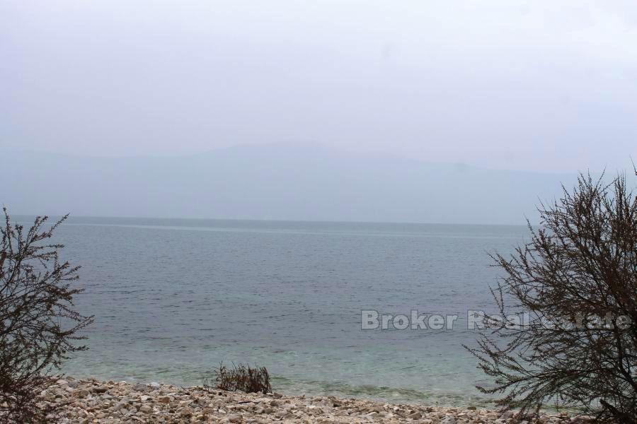 Building land with prefabricated house, for sale