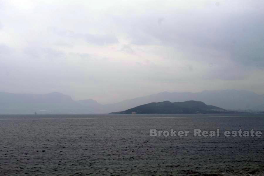 Building land with prefabricated house, for sale