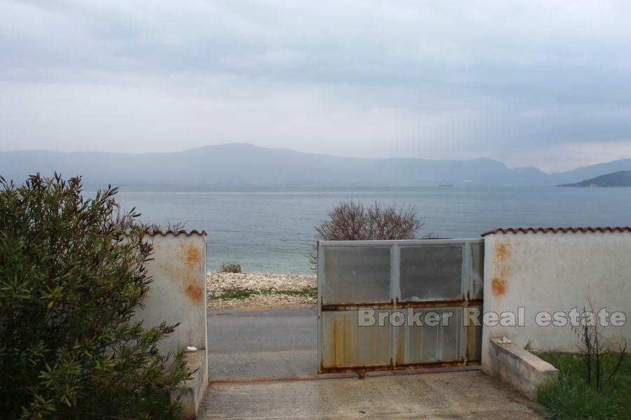 Building land with prefabricated house, for sale