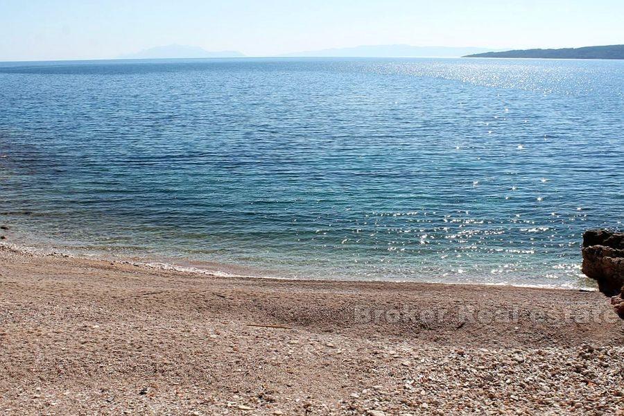 Liten familiehotell, første rad ved sjøen