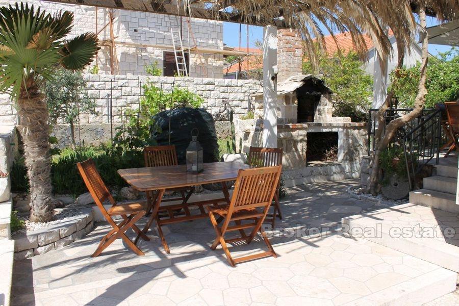 House with pool, first row by the sea