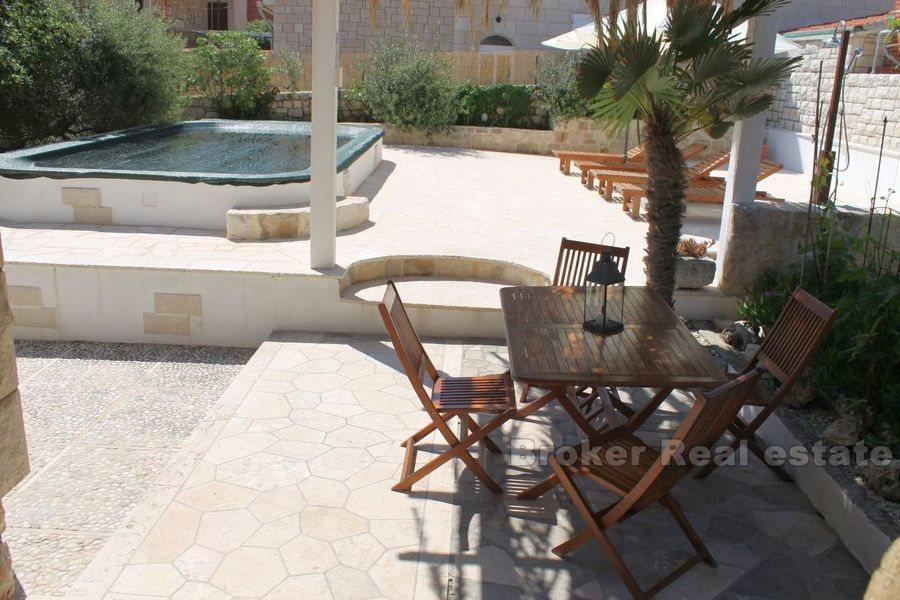 House with pool, first row by the sea