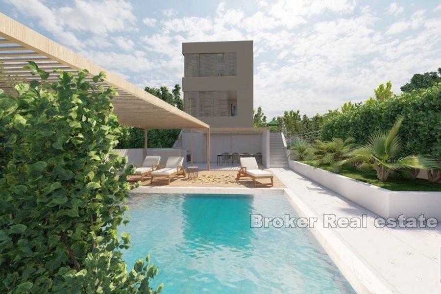 New, unfinished villa, first row to the sea