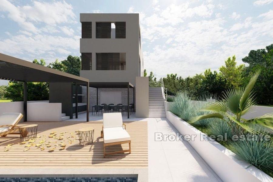 New, unfinished villa, first row to the sea