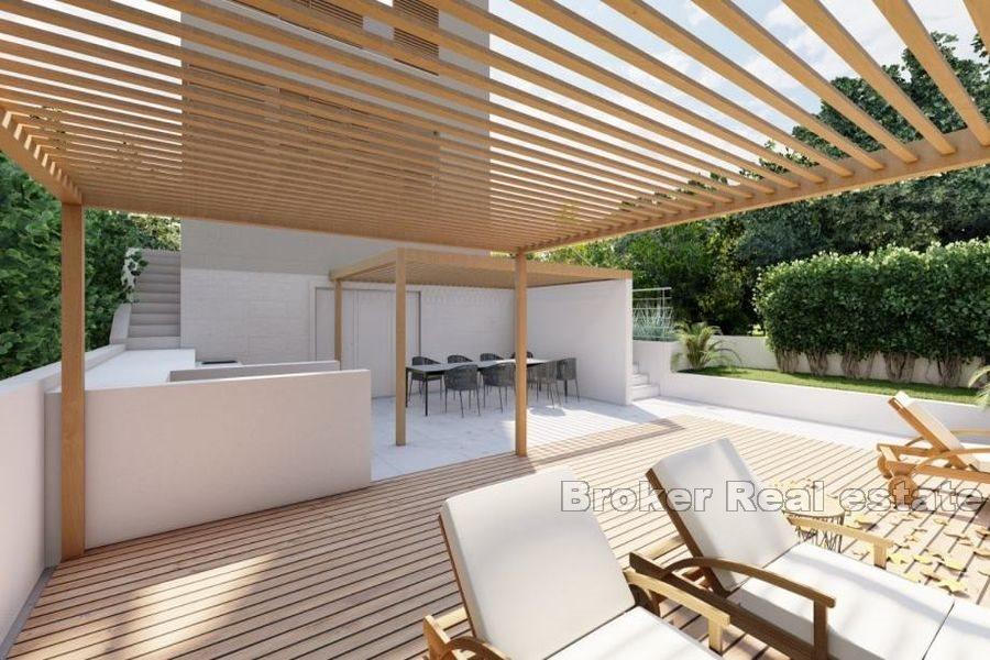 New, unfinished villa, first row to the sea