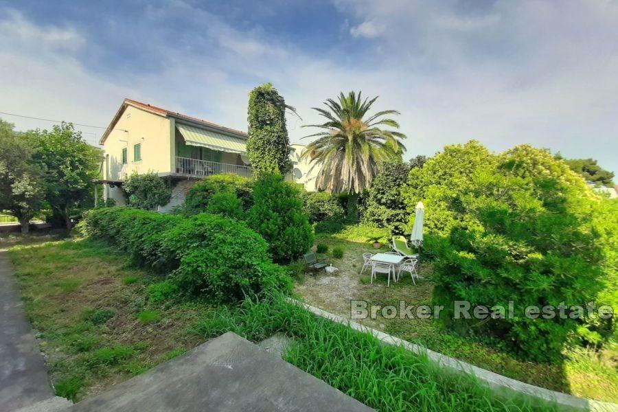 New, unfinished villa, first row to the sea