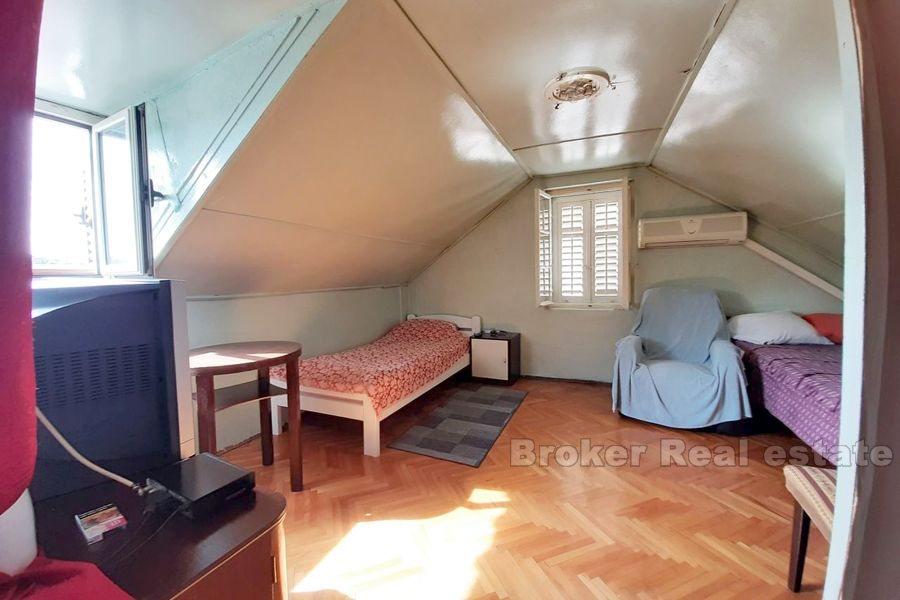 Two-storey apartment with private garden