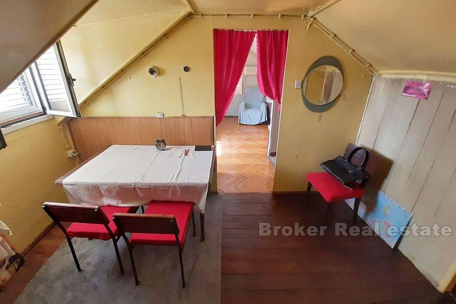 Two-storey apartment with private garden