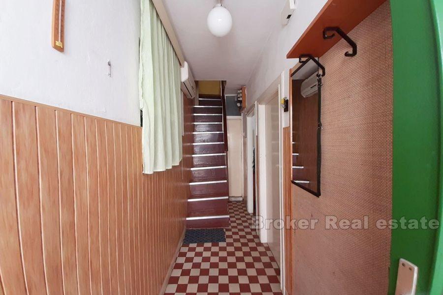 Two-storey apartment with private garden