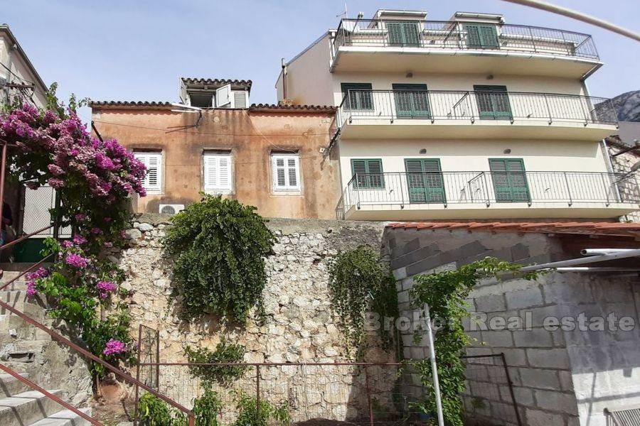 Two-storey apartment with private garden